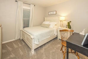 2 habitaciones y tabla de planchar con plancha