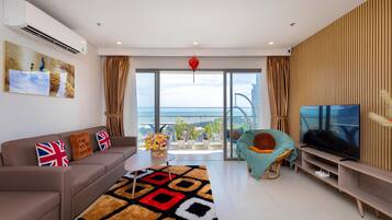 Luxury Apartment, 3 Bedrooms, Balcony, Ocean View | Living area | 48-inch TV with cable channels, table football, ping pong