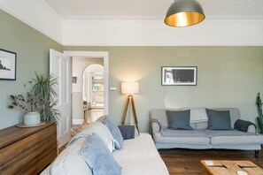 TV, fireplace, books, offices