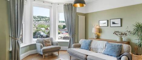 TV, fireplace, books, offices