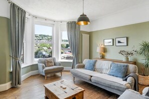 TV, fireplace, books, offices