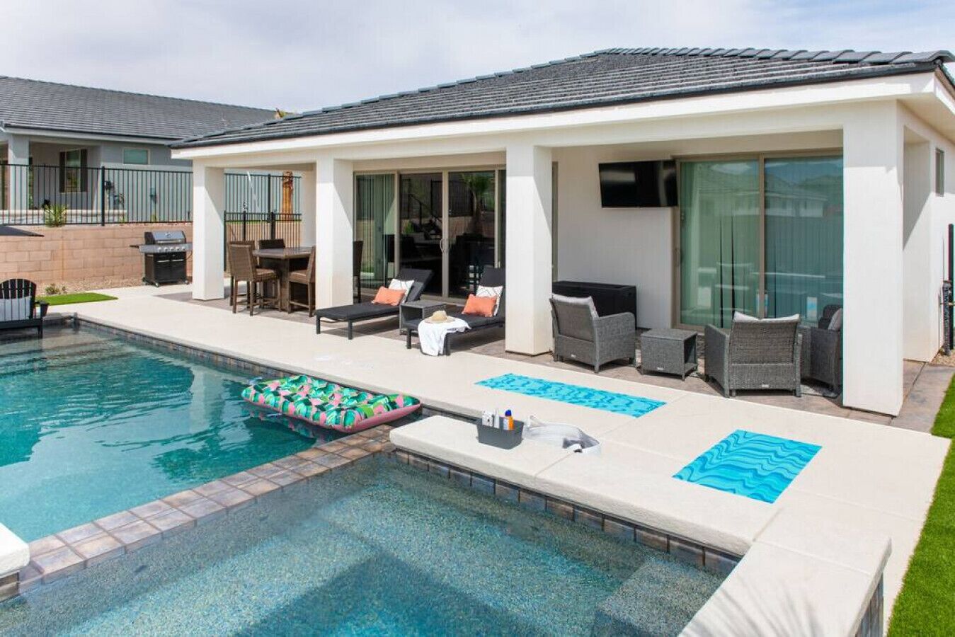 Grill, sit around the fire and eat, lounge, watch TV, soak and swim.