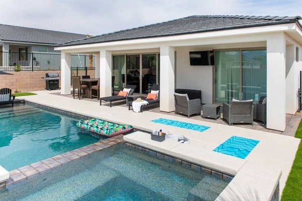 Grill, sit around the fire and eat, lounge, watch TV, soak and swim.