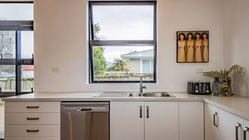 Fridge, dishwasher, toaster, cookware/dishes/utensils