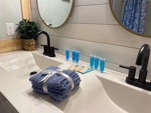 Hair dryer, towels, soap, shampoo