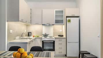 Fridge, stovetop, electric kettle, high chair
