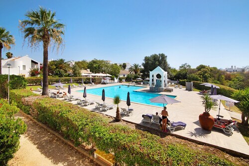 Vacation Home 'Quinta Velha Village 134" with Balcony, Shared Pool & A/C