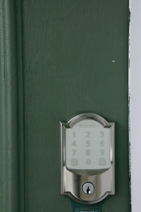 A door with a numeric keypad lock.