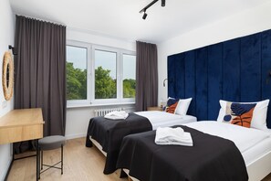 Apartamento superior | 2 dormitorios, tabla de planchar con plancha, wifi gratis y ropa de cama
