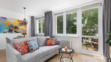 Superior Apartment | Living area | 42-inch plasma TV with satellite channels, TV