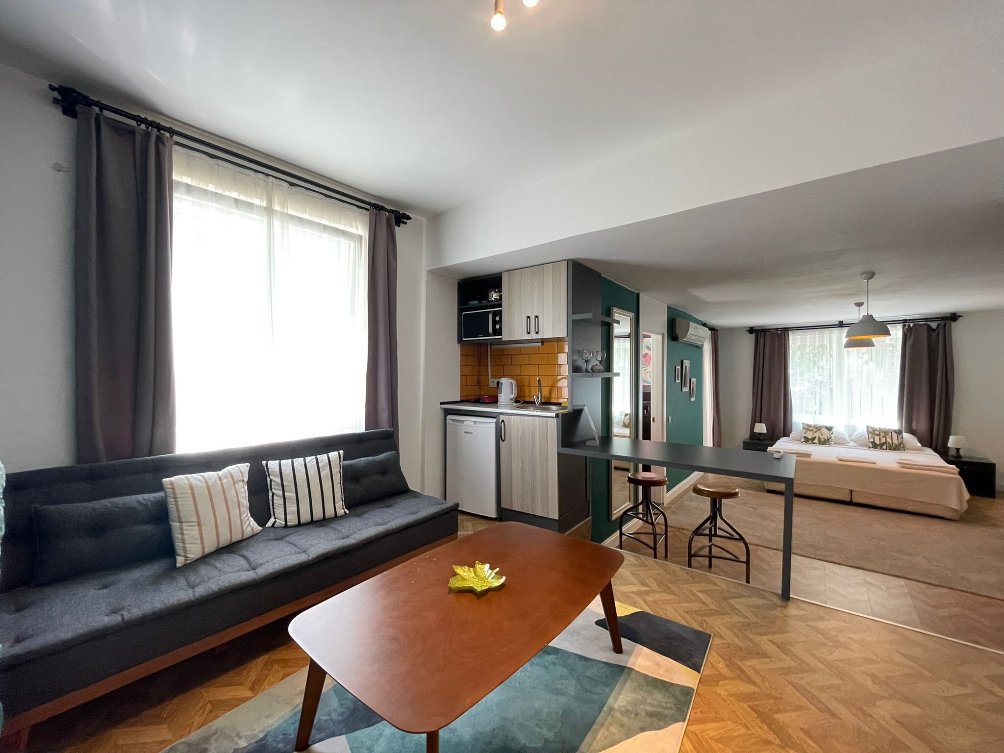 Deluxe Double Room | Private kitchen | Coffee/tea maker, electric kettle, highchair