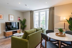 Business Apartment | Living area | 50-inch flat-screen TV with digital channels - YourApartment - Wellington Place (Bristol)