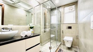 Shower, hair dryer, towels, soap
