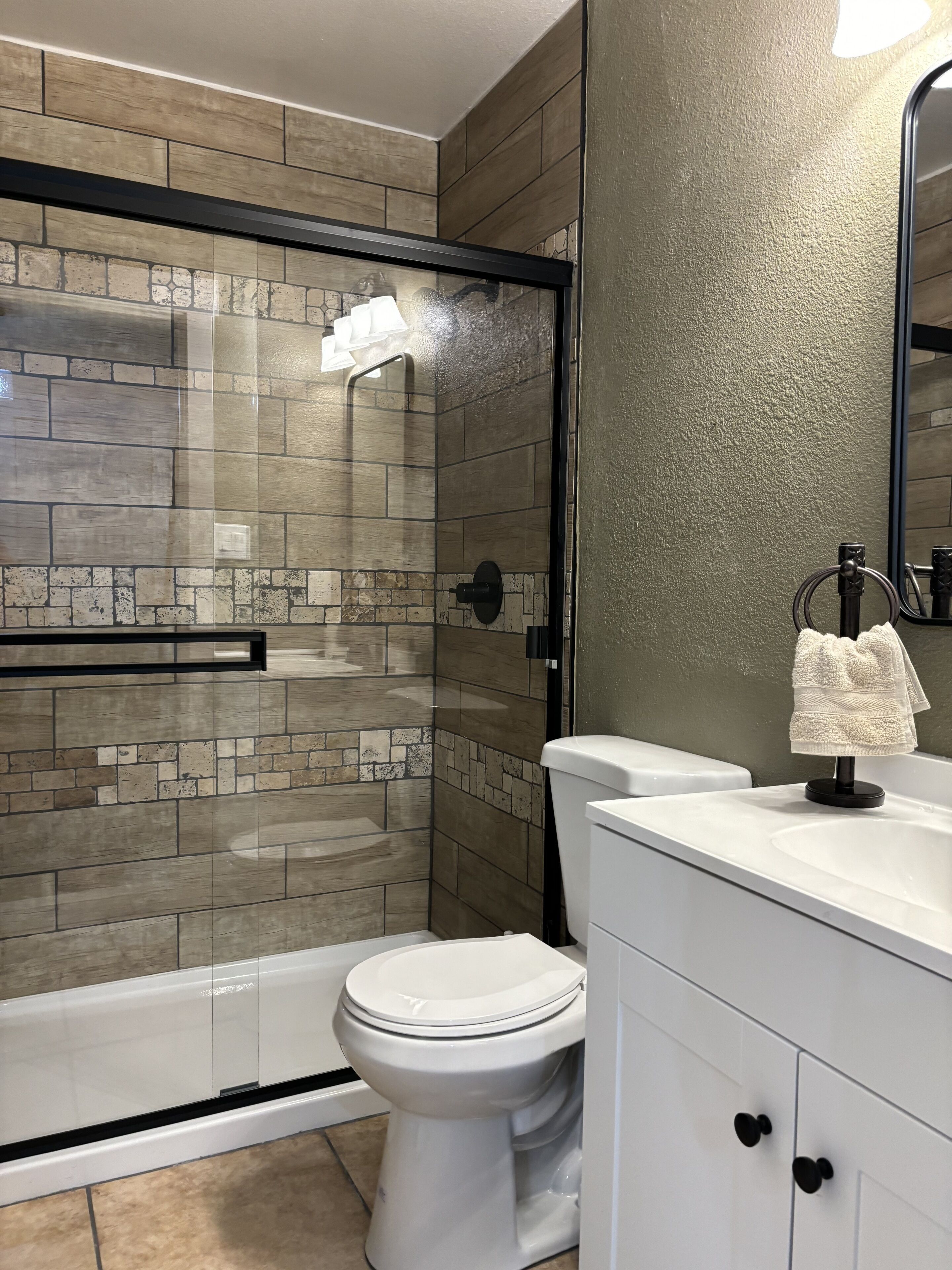 Shower, jetted tub, hair dryer, towels