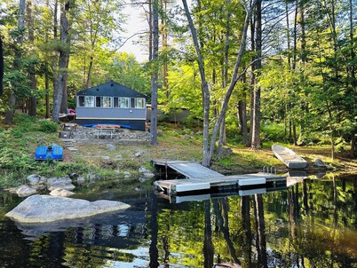 Professionally styled waterfront cottage on Sebago.  Cozy and Serene.