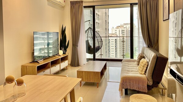 Living area - Cozy 2BR Muji Gem: Beach Escape with Blazing Fast WiFi, Just 2 Mins to the Beach (Johor Bahru)