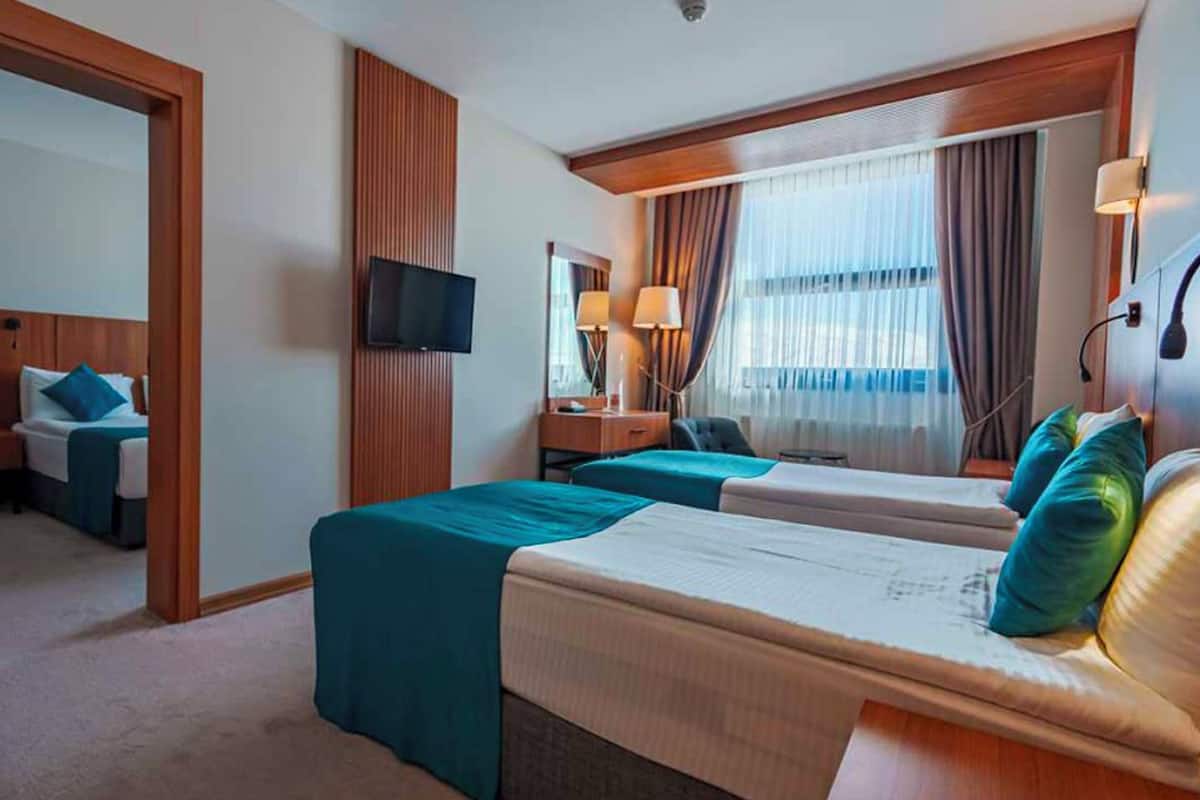 Chambre Quadruple Familiale | 1 chambre, minibar, coffres-forts dans les chambres