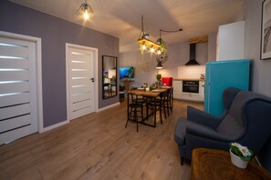 Apartamento Deluxe | Servicio de comidas en la habitación