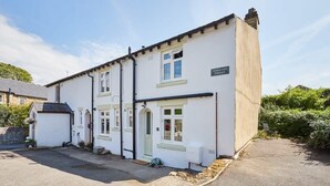 A white building with a sign reading "TEMPERANCE TERRACE." - Host & Stay | Castle View Cottage (Barnard Castle)