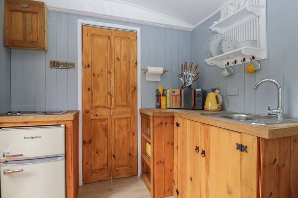 Fridge, electric kettle, toaster, cookware/dishes/utensils