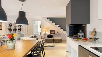 Villa | Living area | 32-inch flat-screen TV with cable channels, TV, fireplace