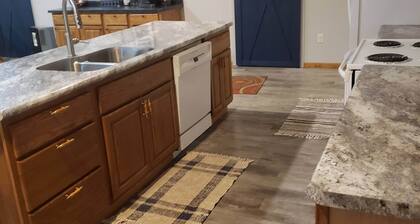 Spacious place w/ outside kitchen. Close to the Apple River and so much more.