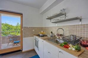 Family Apartment, Multiple Bedrooms (Apartment Good Life) | Private kitchen | Fridge, oven, stovetop, coffee/tea maker - Apartment Good Life (Medulin)