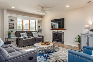 Smart TV, fireplace, books