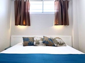 1 slaapkamer, een strijkplank/strijkijzer, wifi, beddengoed