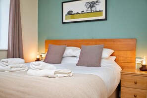 1 habitación, tabla de planchar con plancha, wifi gratis y ropa de cama 