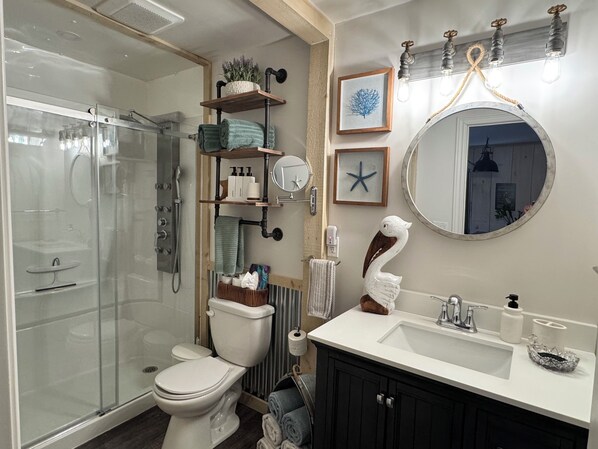 Shower, hair dryer, towels, soap