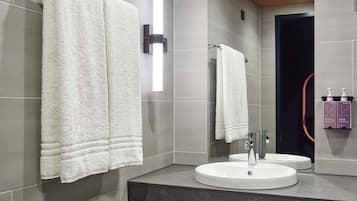 Premium bedding, down comforters, in-room safe, blackout drapes