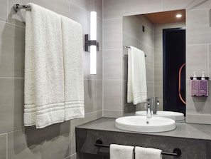 Premium bedding, down duvets, in-room safe, blackout curtains