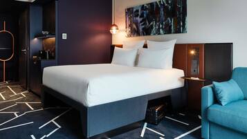 Premium bedding, down comforters, in-room safe, blackout drapes