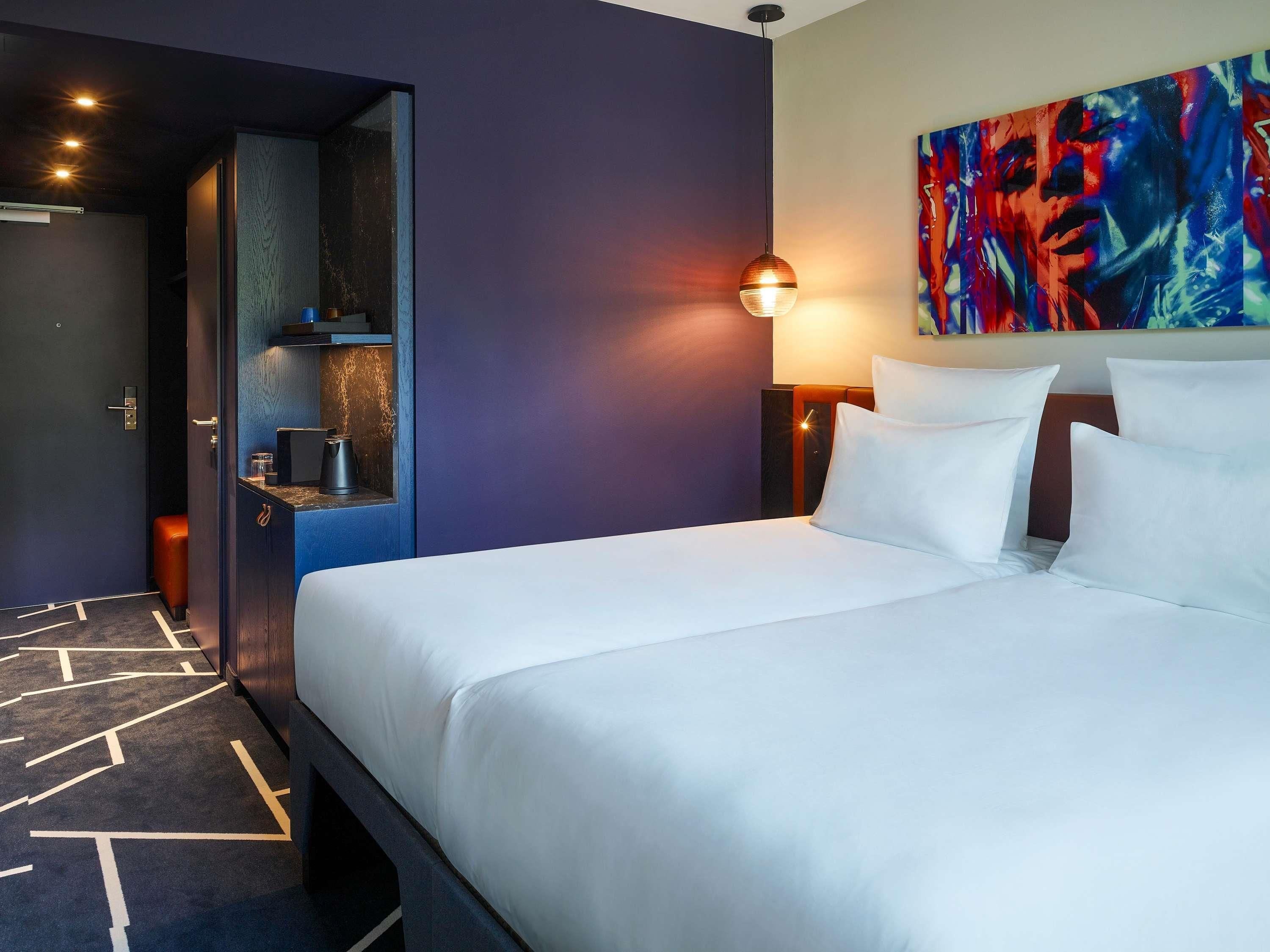 Premium bedding, down comforters, in-room safe, blackout drapes