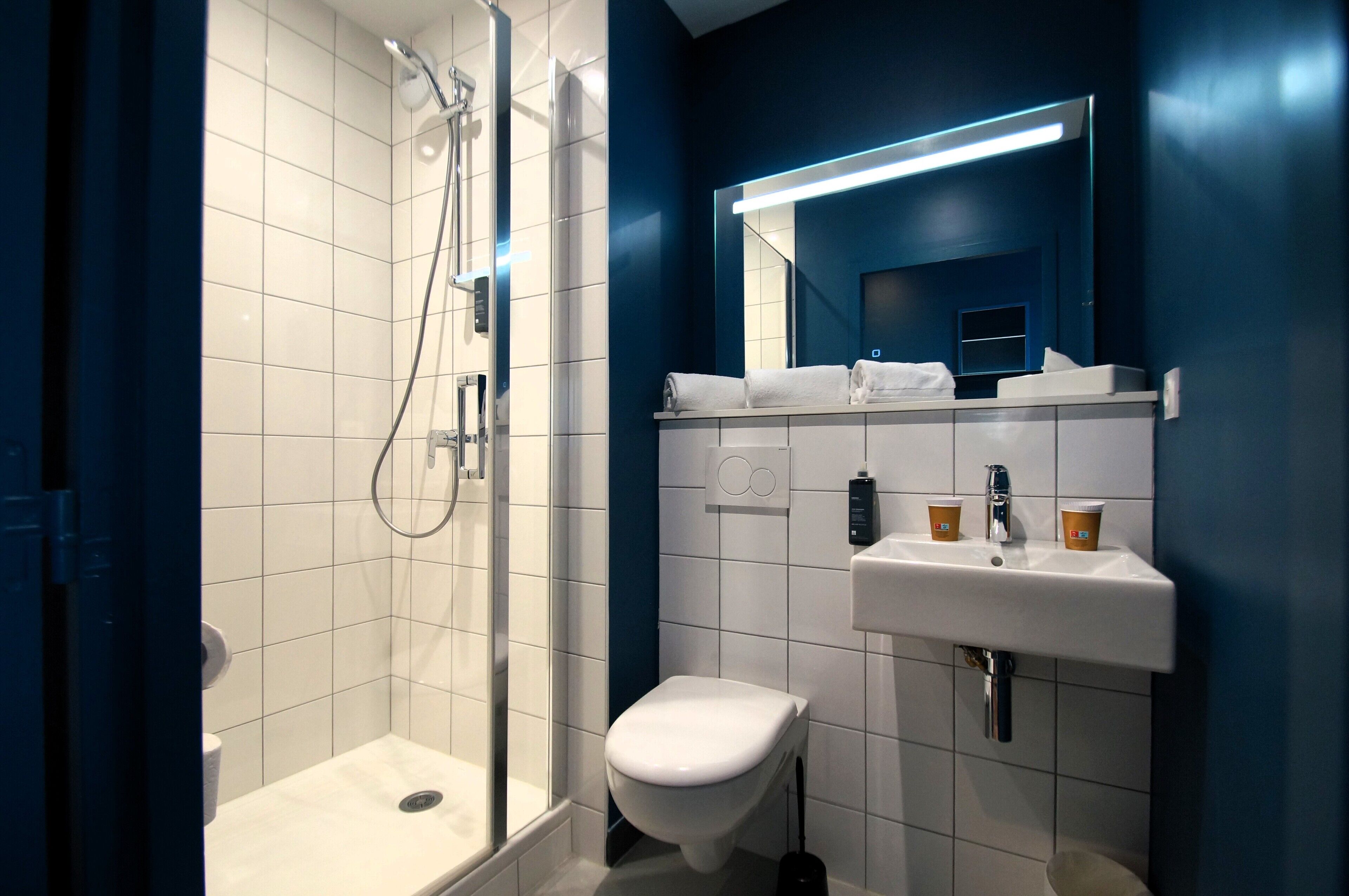 Family Suite, 2 Double Beds, Connecting Rooms | Bathroom | Shower, hair dryer, towels, soap