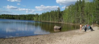 Log cabin. Ramsjö Camping . Ångevägen 24. Timber log nearby river stream