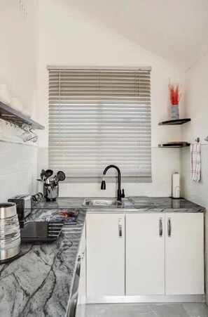 Fridge, microwave, oven, stovetop - Home Away From Home Tiny Cottage
 (Cape Town)