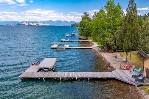 Lakefront home with private beach, dock, firepit, & grill - dazzling sunset view