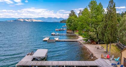 Lakefront home with private beach, dock, firepit, & grill - dazzling sunset view