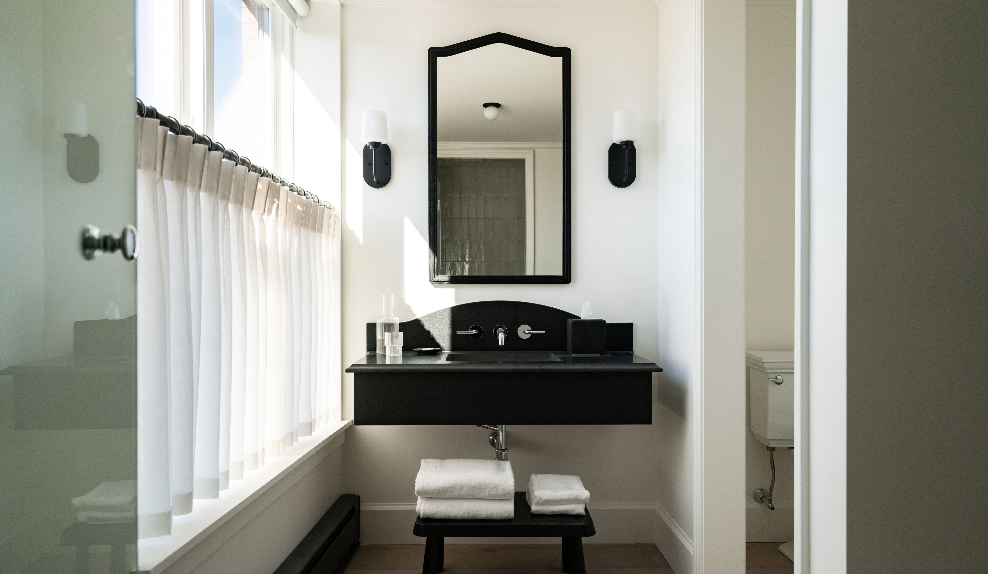 designer toiletries, hair dryer, bathrobes, towels