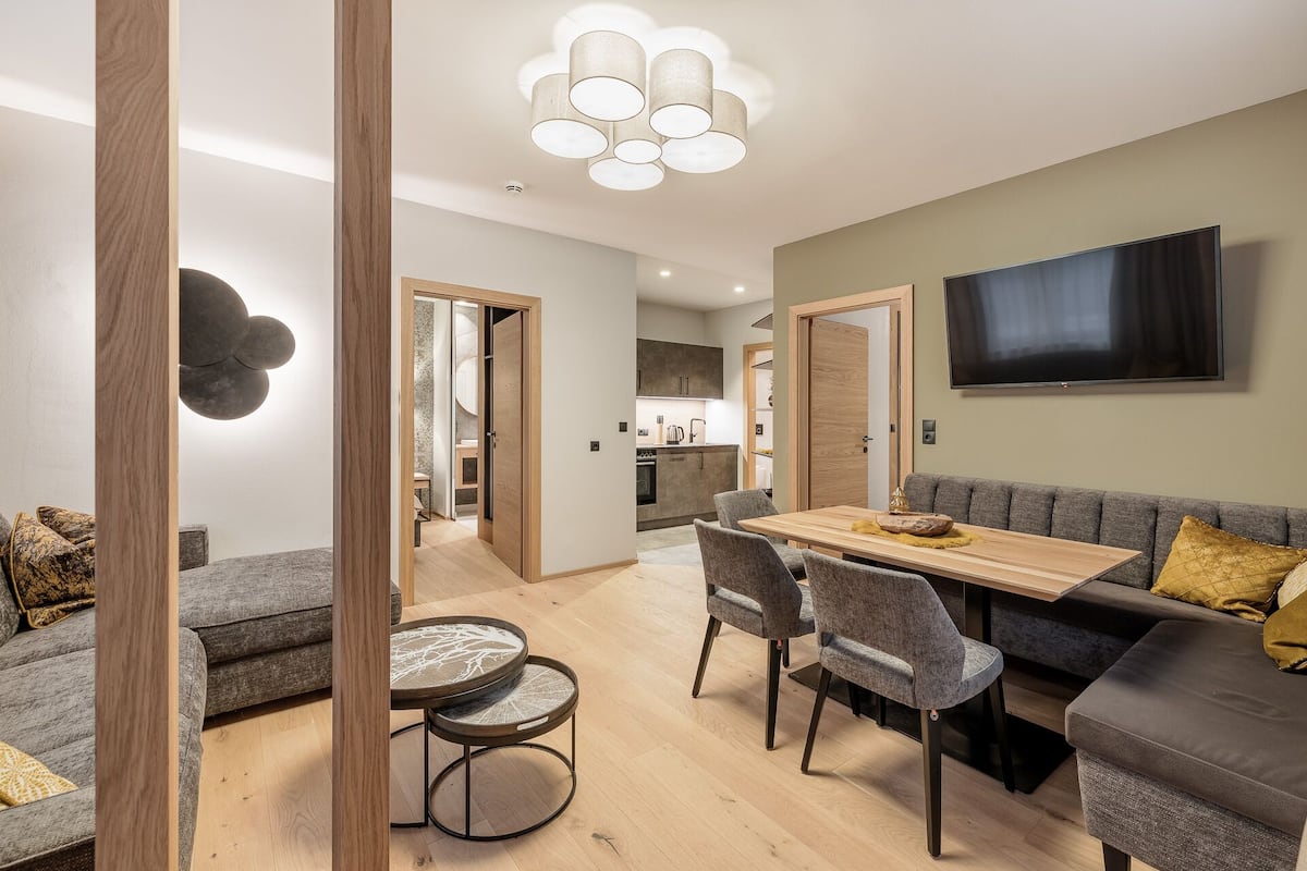 Family Apartment | Living area | 110-cm Smart TV with cable channels