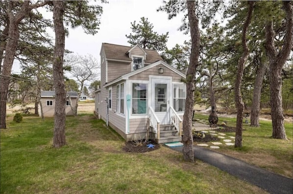 Stroll up to the charming front porch and enter this inviting home.