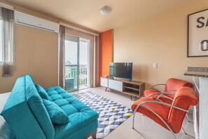 Apartamento básico | Área de estar | TV