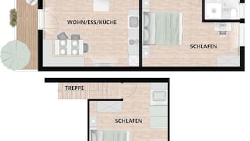 Distribución de un hotel con sala de estar, cocina, baño y dos dormitorios.
