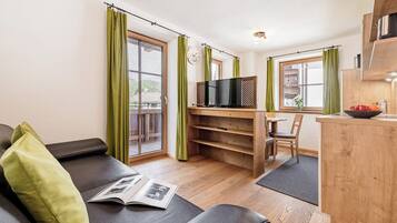 Family Apartment, Balcony, Mountain View | Living area | TV