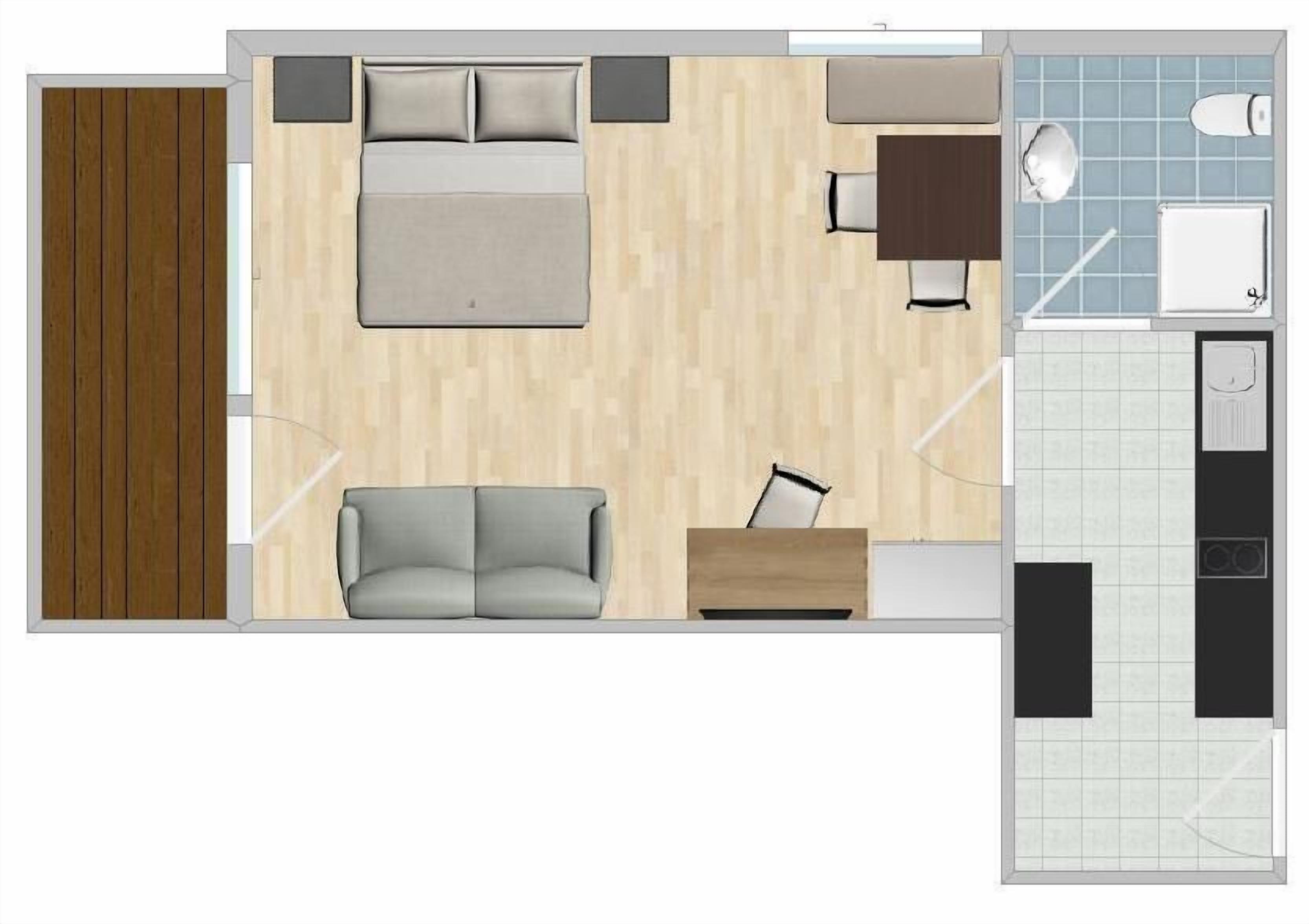 A hotel room layout with a bed, sofa, desk, and kitchenette.