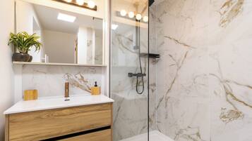 Hair dryer, towels, soap, toilet paper