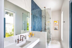Blue Room | Bathroom | Shower, designer toiletries, hair dryer, towels - Grand Maloney Hotel (Key West)