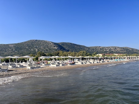 Beach nearby, sun loungers, beach towels. Luxury Garden Villa • Outdoor Spa Bath • Serenity Retreat